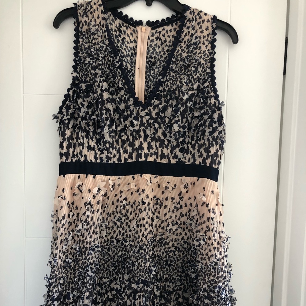 Dress with 3D floral appliqués